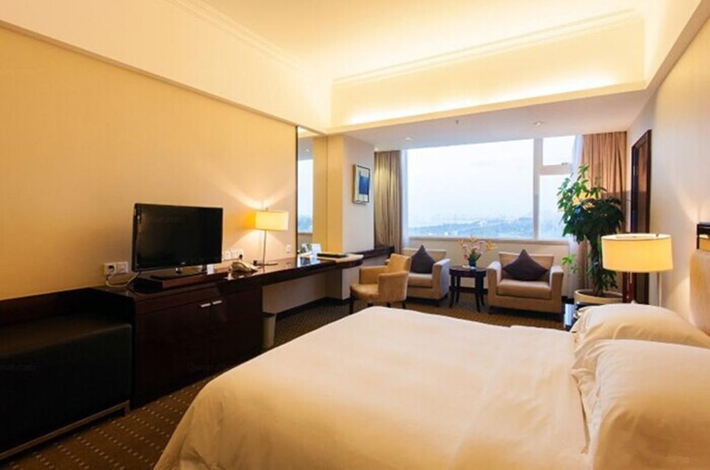 Tienyow Grand Hotel Haikou  Zimmer foto