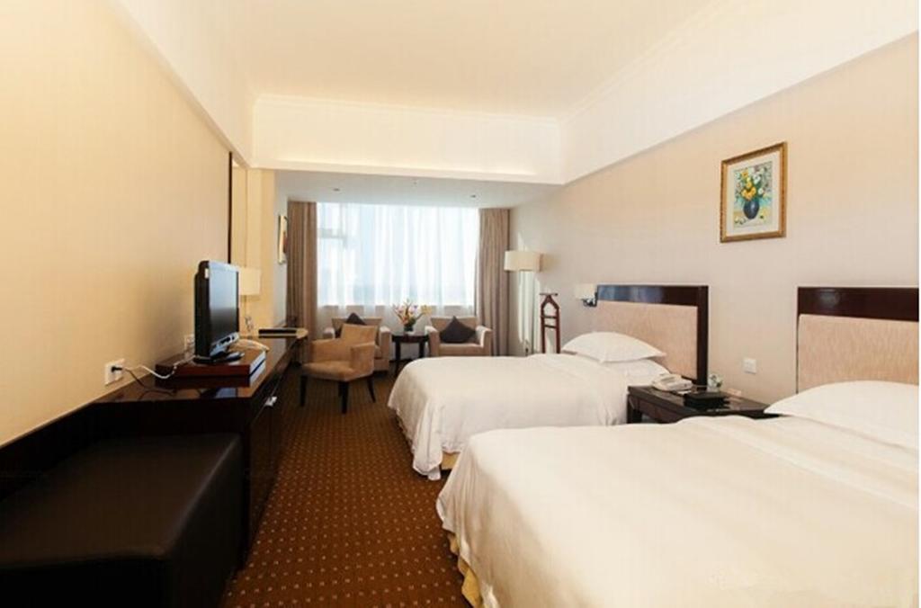 Tienyow Grand Hotel Haikou  Zimmer foto