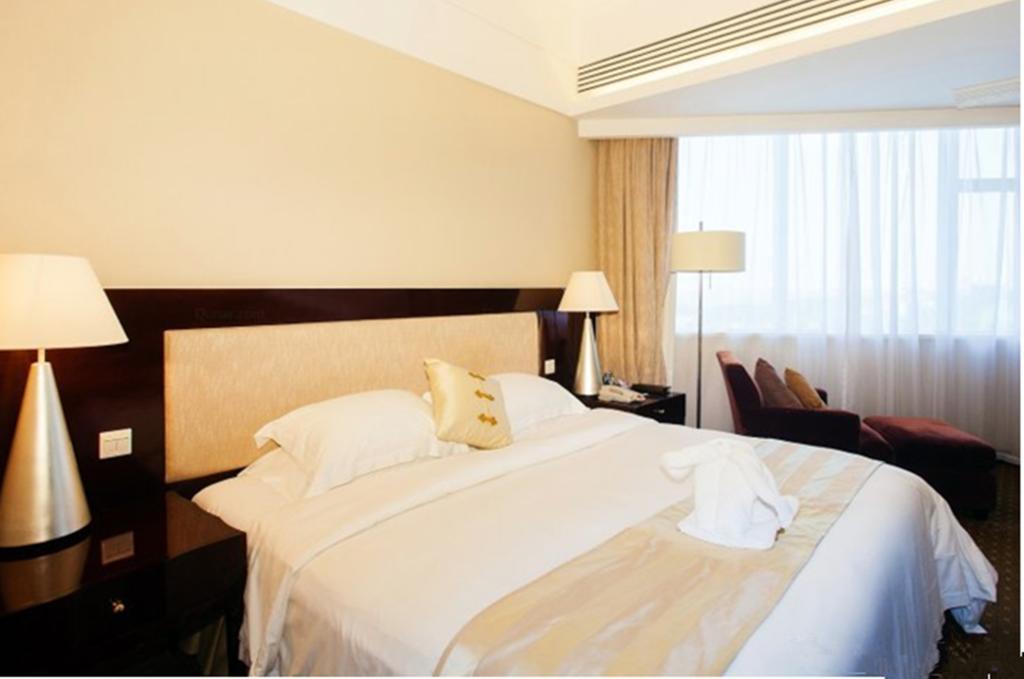 Tienyow Grand Hotel Haikou  Zimmer foto