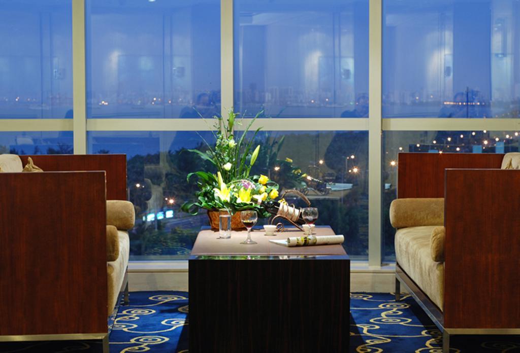 Tienyow Grand Hotel Haikou  Zimmer foto